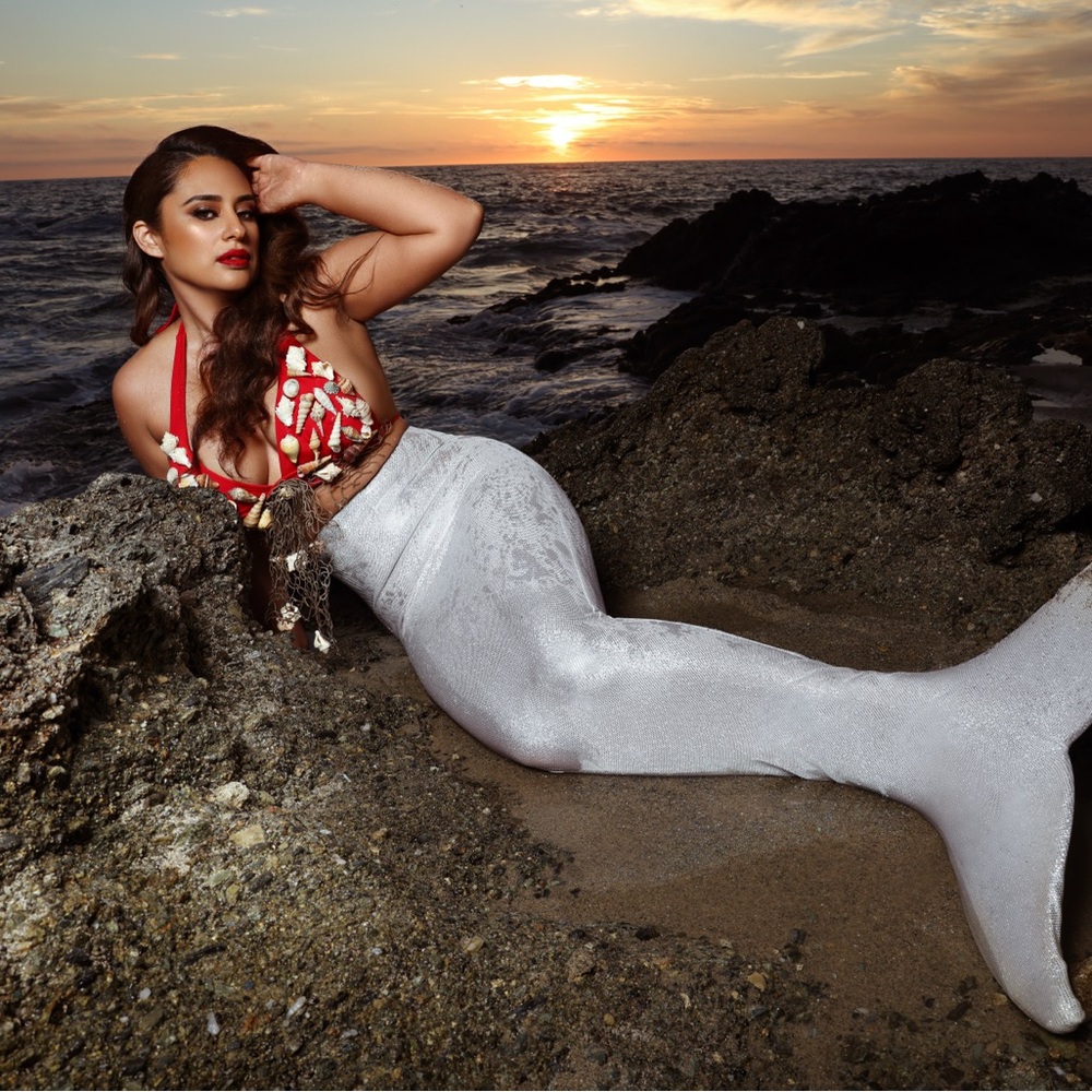 Kids mermaid tail one size. Fits a size small adult.